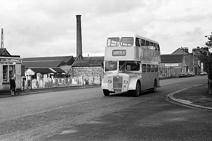 Graham’s_bus_passing_Hawkhead_Cemetery,Paisley–1970-geograph.org.uk-_7054032